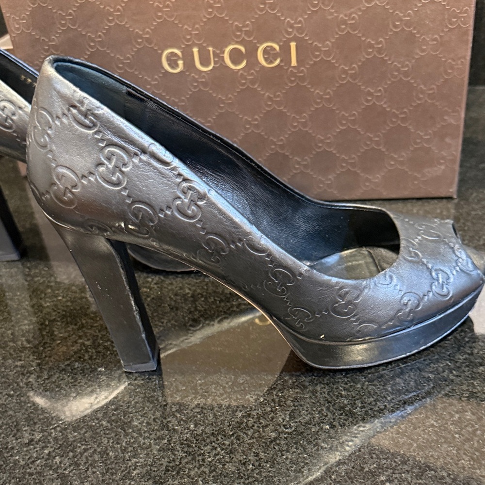 Gucci Black Embossed GG Platform Pumps